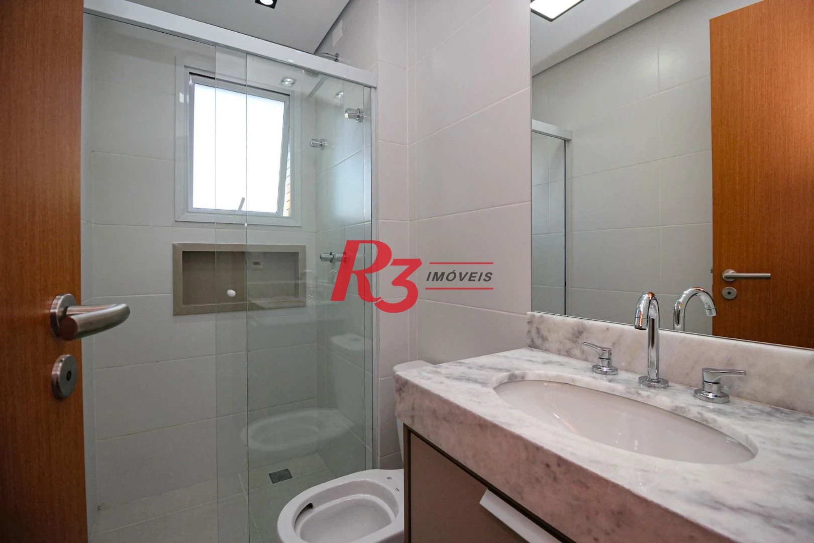 Apartamento com 2 dormitórios para alugar, 65 m² por R$ 6.900,00/mês - Vila Rica - Santos/SP