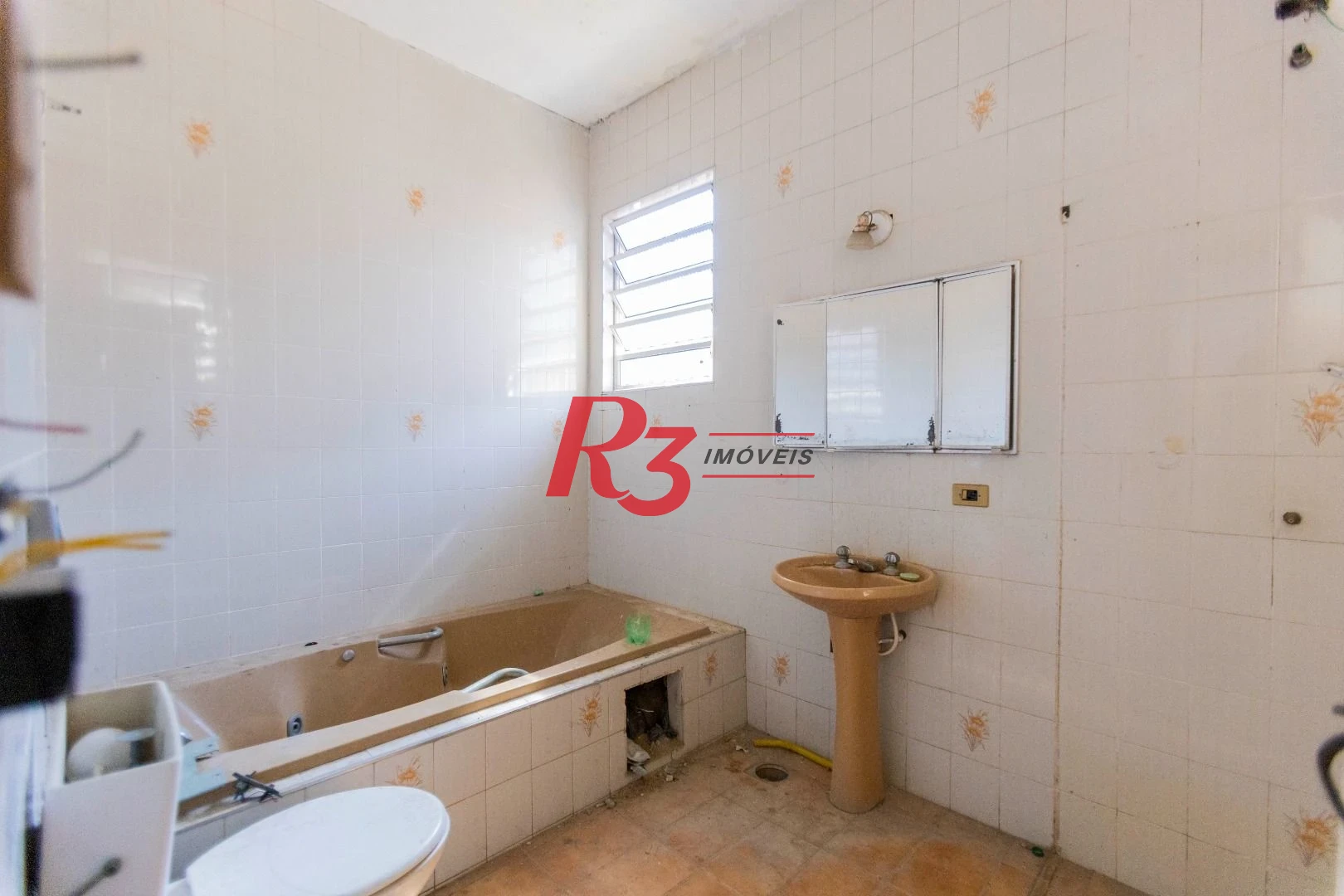 Sobrado com 4 dormitórios à venda, 258 m² por R$ 3.500.000,00 - Ponta da Praia - Santos/SP