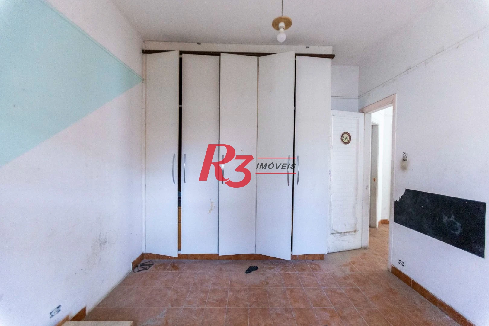 Sobrado com 4 dormitórios à venda, 258 m² por R$ 3.500.000,00 - Ponta da Praia - Santos/SP