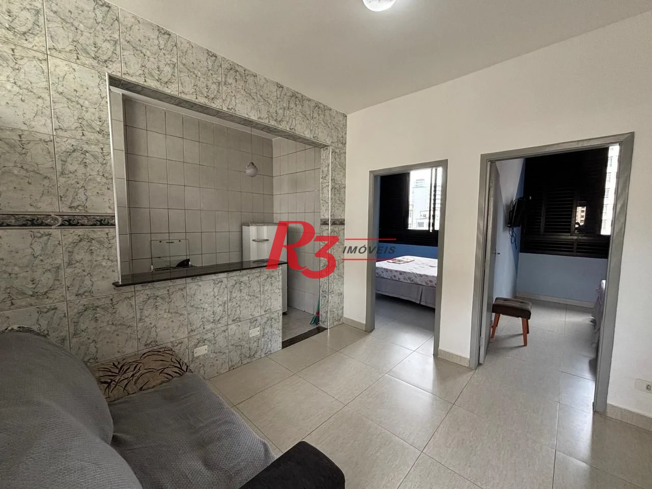 Apartamento com 2 dormitórios frente praia à venda, 55 m² por R$ 352.000 - Gonzaga - Santos/SP