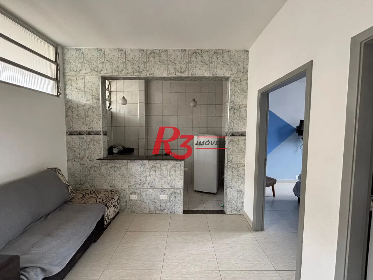 Apartamento com 2 dormitórios frente praia à venda, 55 m² por R$ 352.000 - Gonzaga - Santos/SP