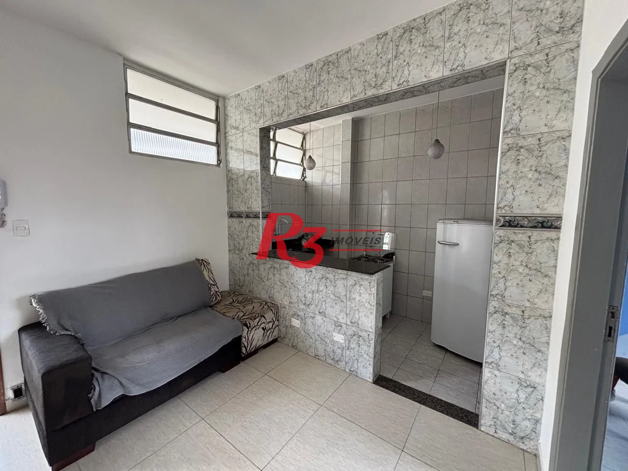 Apartamento com 2 dormitórios frente praia à venda, 55 m² por R$ 352.000 - Gonzaga - Santos/SP