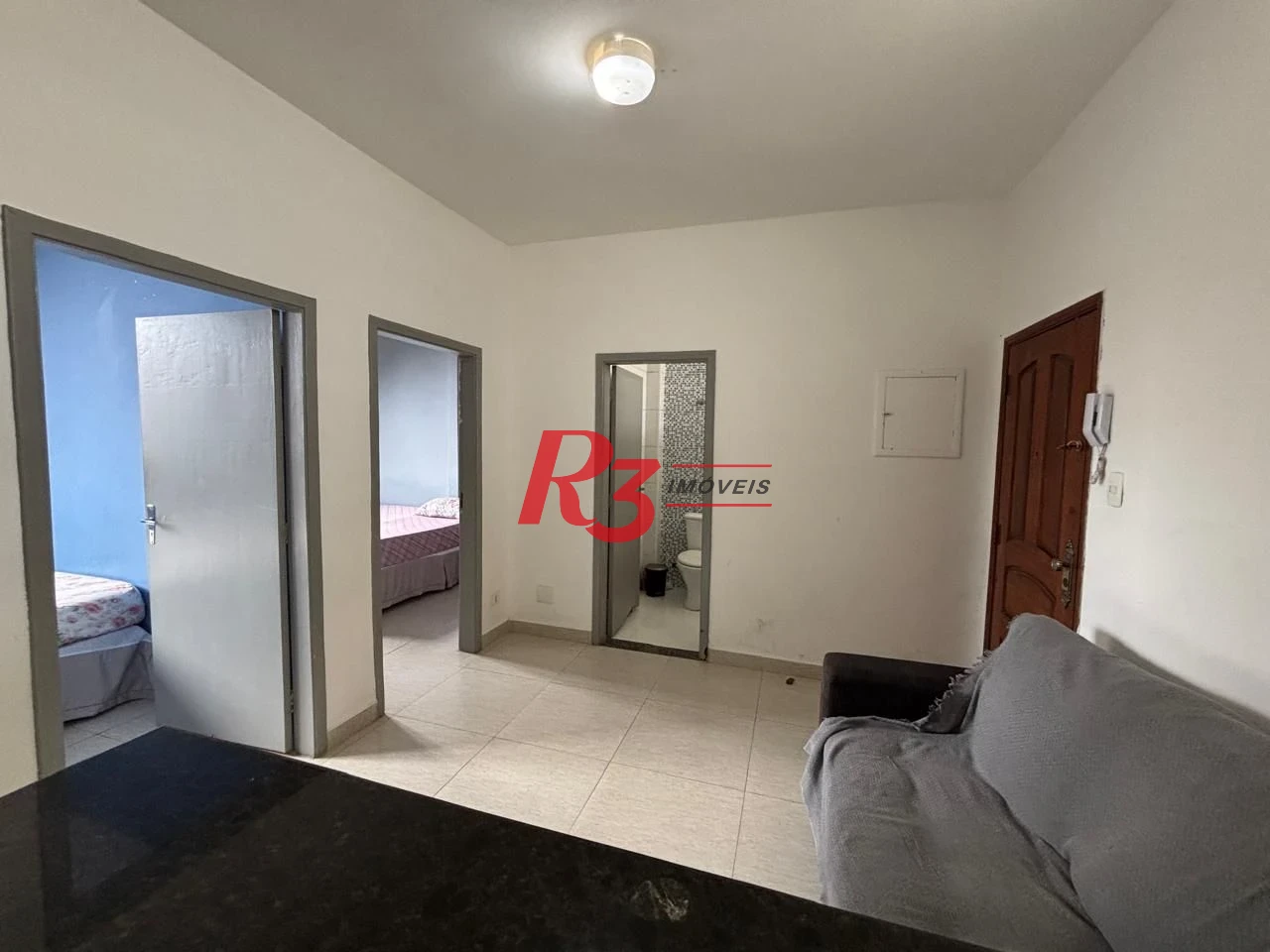 Apartamento com 2 dormitórios frente praia à venda, 55 m² por R$ 352.000 - Gonzaga - Santos/SP