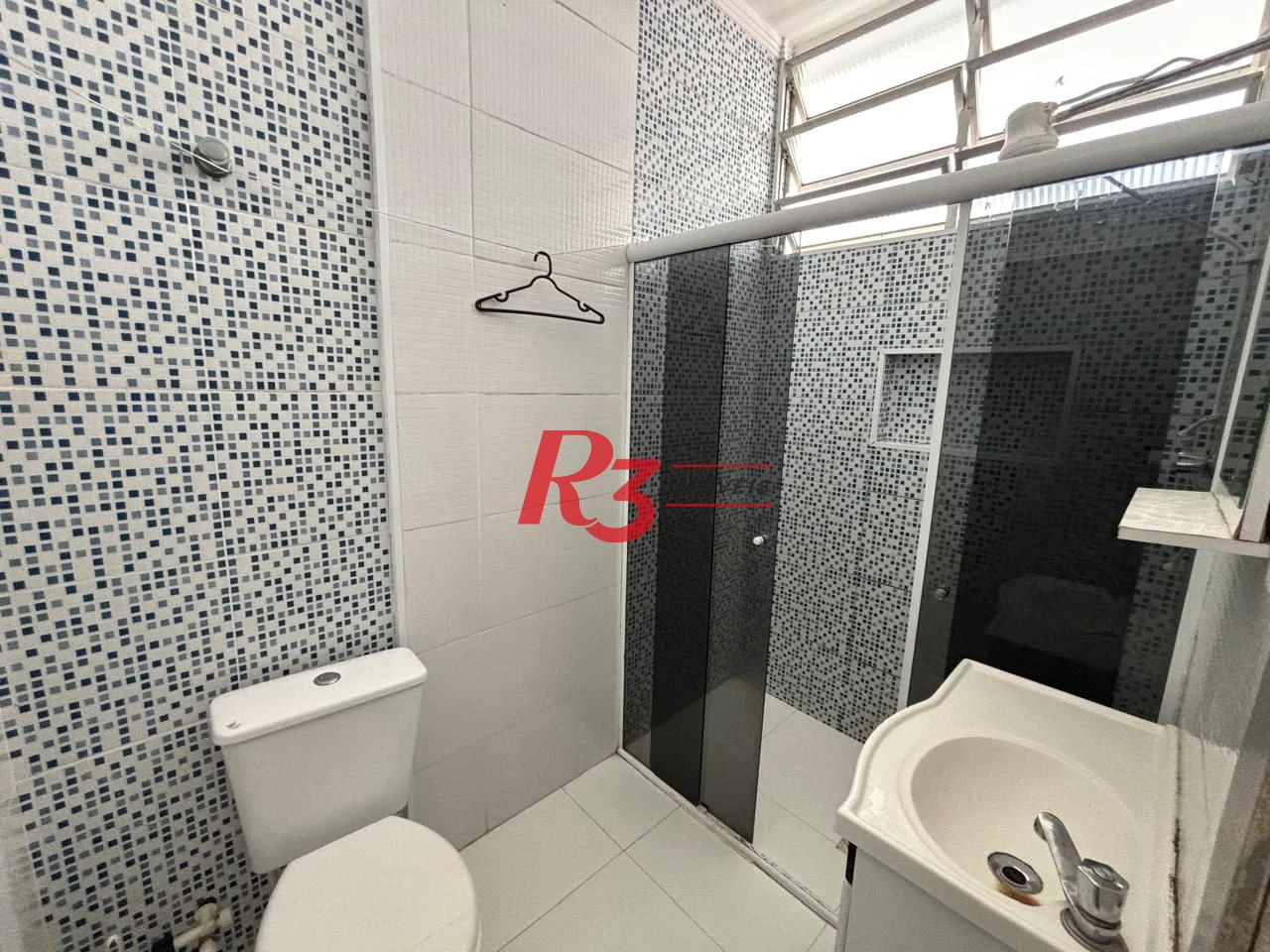 Apartamento com 2 dormitórios frente praia à venda, 55 m² por R$ 352.000 - Gonzaga - Santos/SP
