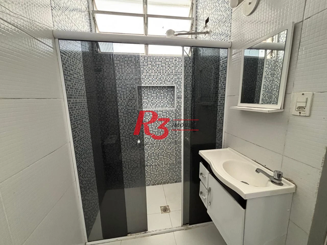 Apartamento com 2 dormitórios frente praia à venda, 55 m² por R$ 352.000 - Gonzaga - Santos/SP