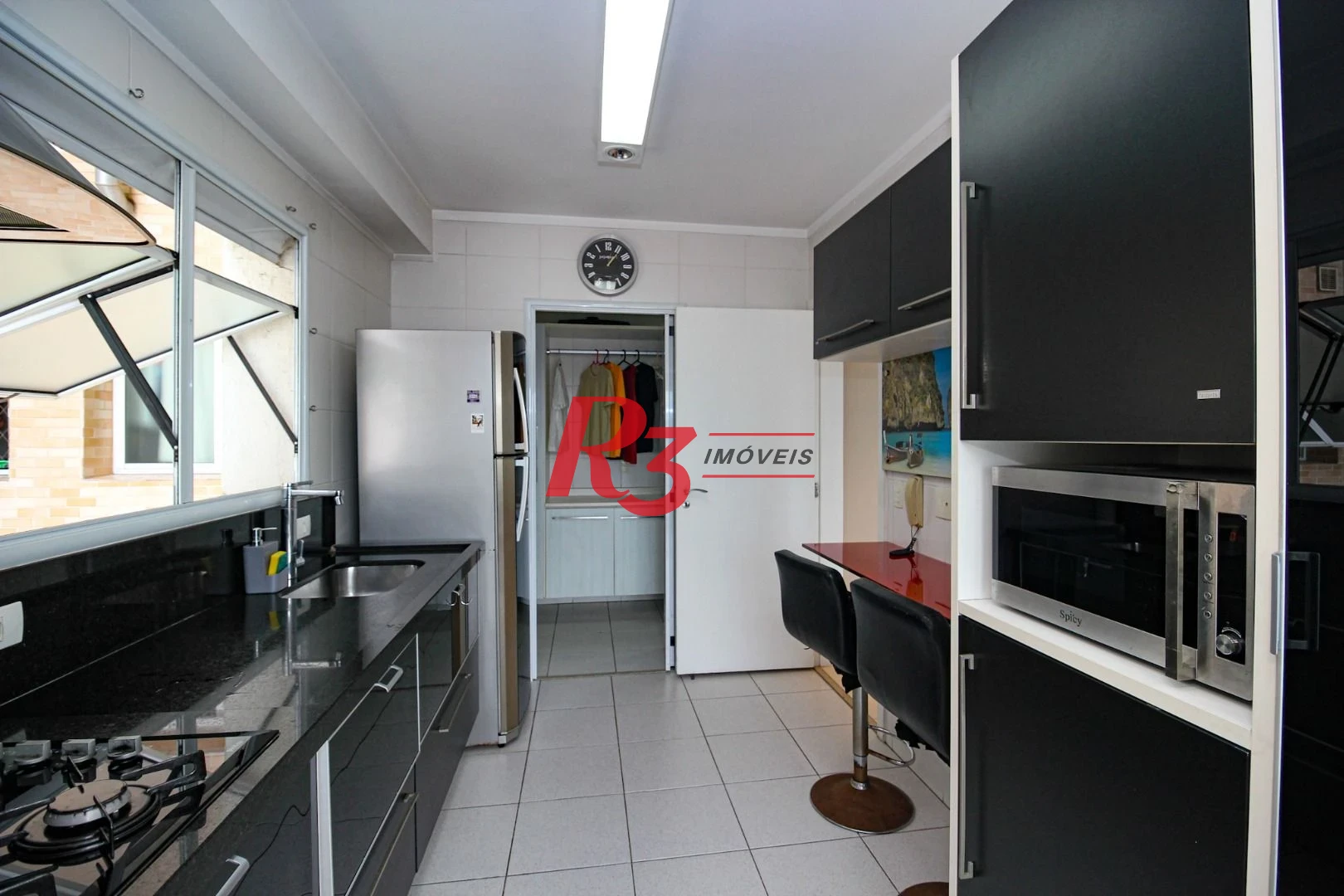 Apartamento com 2 dormitórios à venda, 131 m² por R$ 1.950.000,00 - Gonzaga - Santos/SP