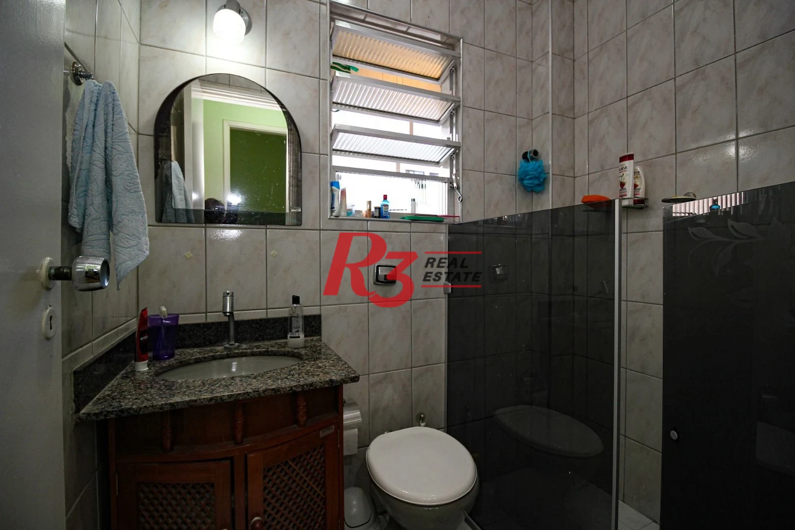 Apartamento com 2 dormitórios à venda, 60 m² por R$ 385.000,00 - Gonzaga - Santos/SP