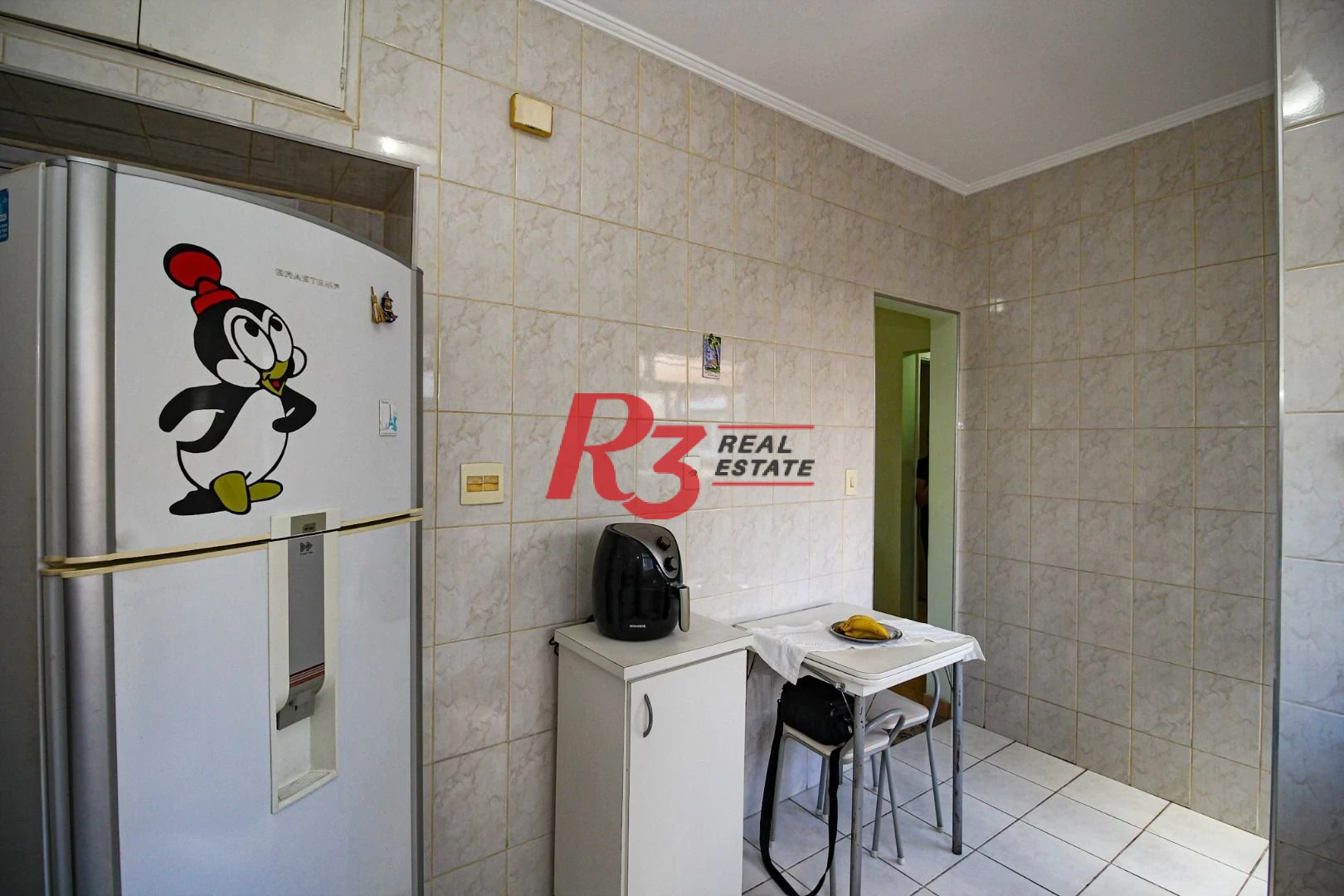 Apartamento com 2 dormitórios à venda, 60 m² por R$ 385.000,00 - Gonzaga - Santos/SP
