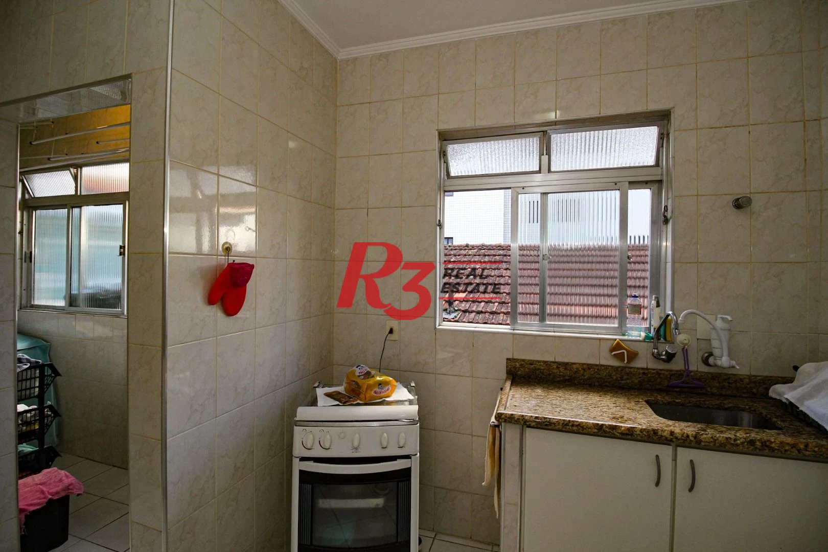 Apartamento com 2 dormitórios à venda, 60 m² por R$ 385.000,00 - Gonzaga - Santos/SP