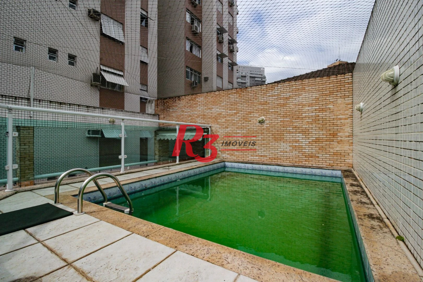 Casa com 4 dormitórios para alugar, 320 m² por R$ 10.000,00/mês - Gonzaga - Santos/SP