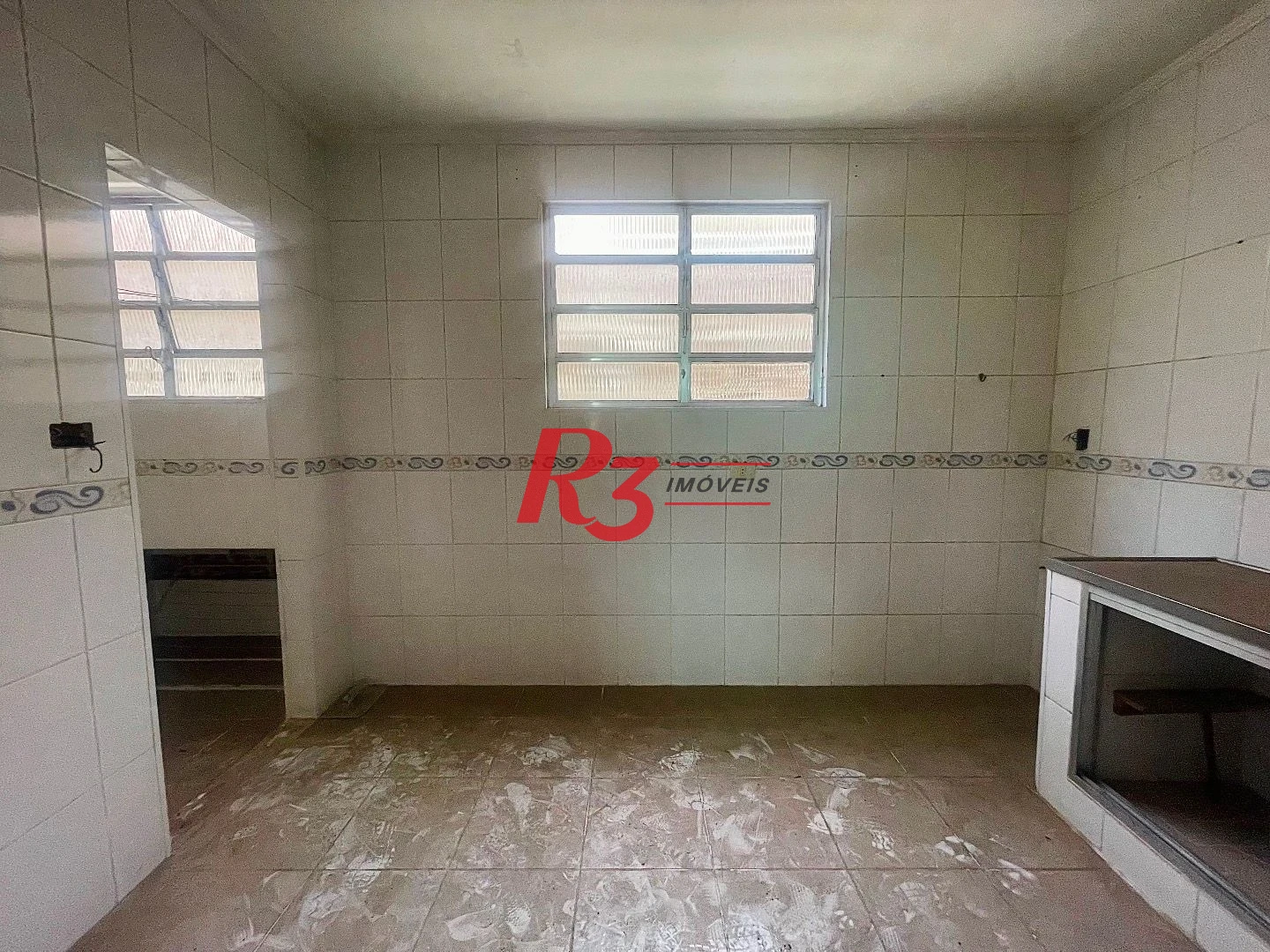 Prédio para alugar, 660 m² por R$ 9.000,00/mês - Ponta da Praia - Santos/SP