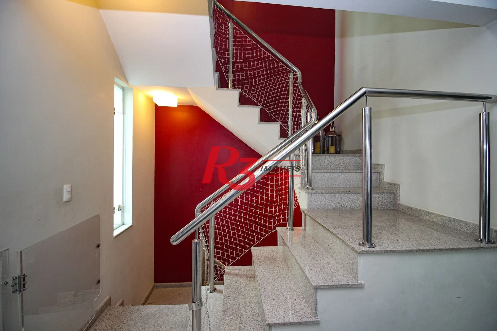 Casa com 4 dormitórios à venda, 240 m² por R$ 2.600.000,00 - Ponta da Praia - Santos/SP