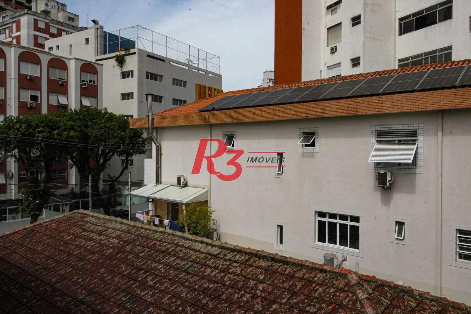 Casa com 4 dormitórios à venda, 240 m² por R$ 2.600.000,00 - Ponta da Praia - Santos/SP