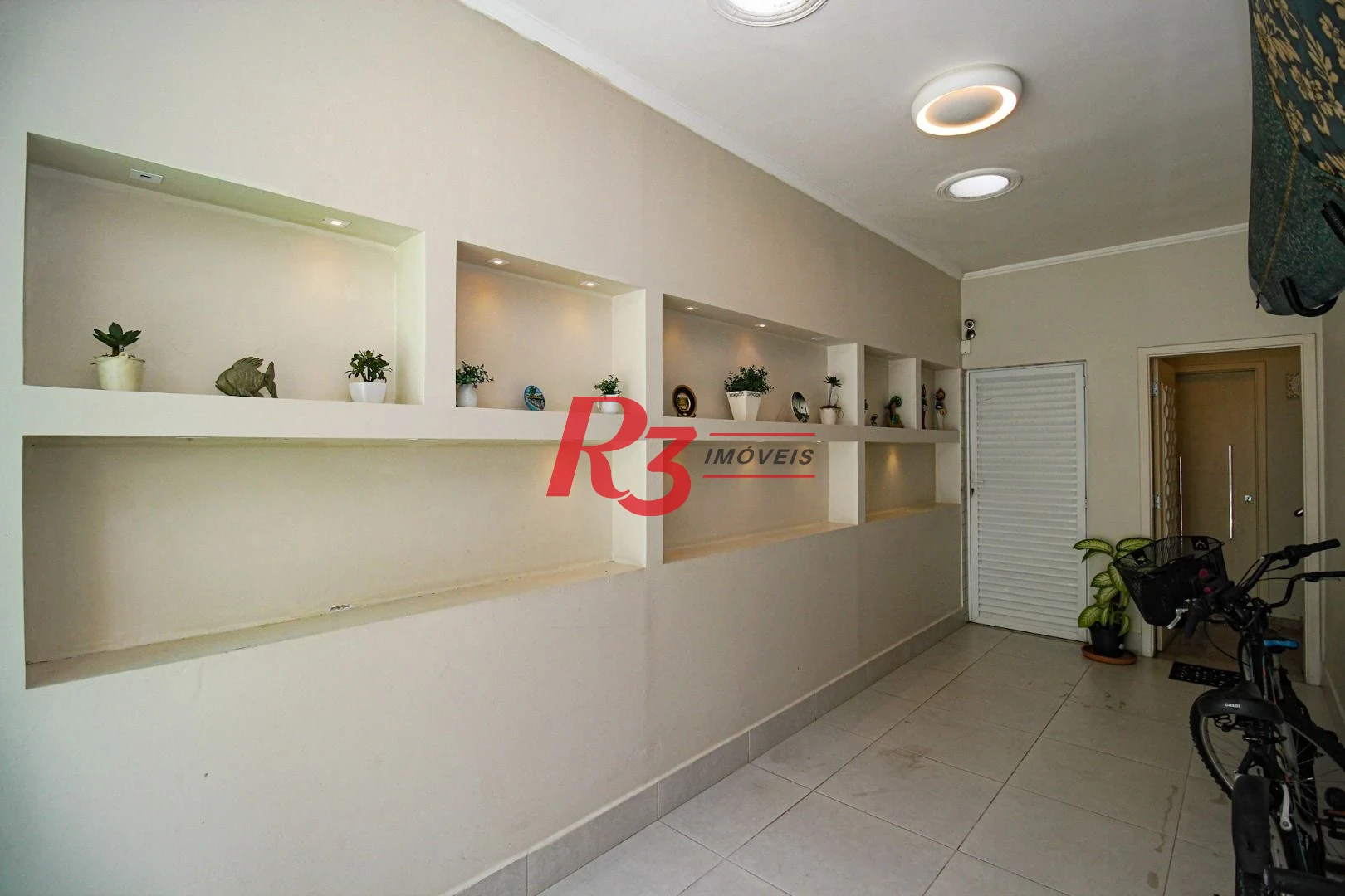Casa com 4 dormitórios à venda, 240 m² por R$ 2.600.000,00 - Ponta da Praia - Santos/SP