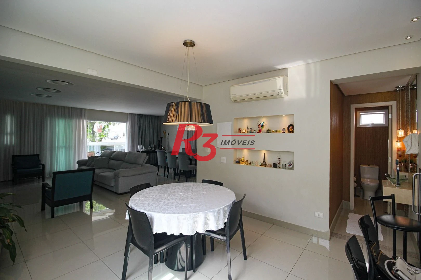 Casa com 4 dormitórios à venda, 240 m² por R$ 2.600.000,00 - Ponta da Praia - Santos/SP