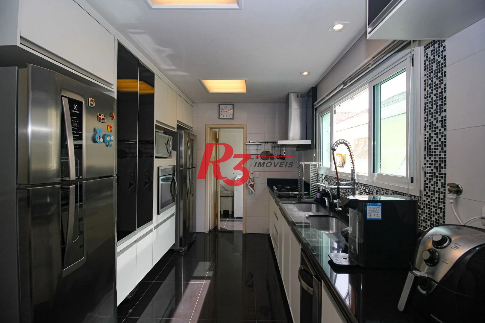 Casa com 4 dormitórios à venda, 240 m² por R$ 2.600.000,00 - Ponta da Praia - Santos/SP