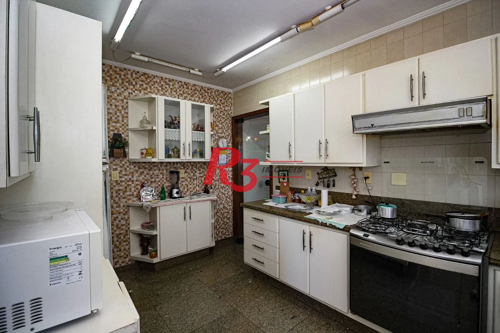 Apartamento com 4 suítes, Vista parcial do Mar, à venda, 289 m² por R$ 1.590.000 - Ponta da Praia - Santos/SP