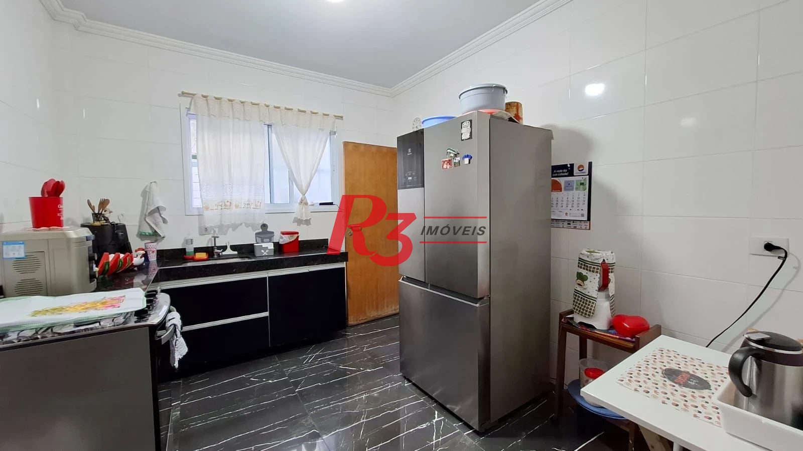 Casa com 2 dormitórios à venda, 100 m² por R$ 890.000,00 - Aparecida - Santos/SP