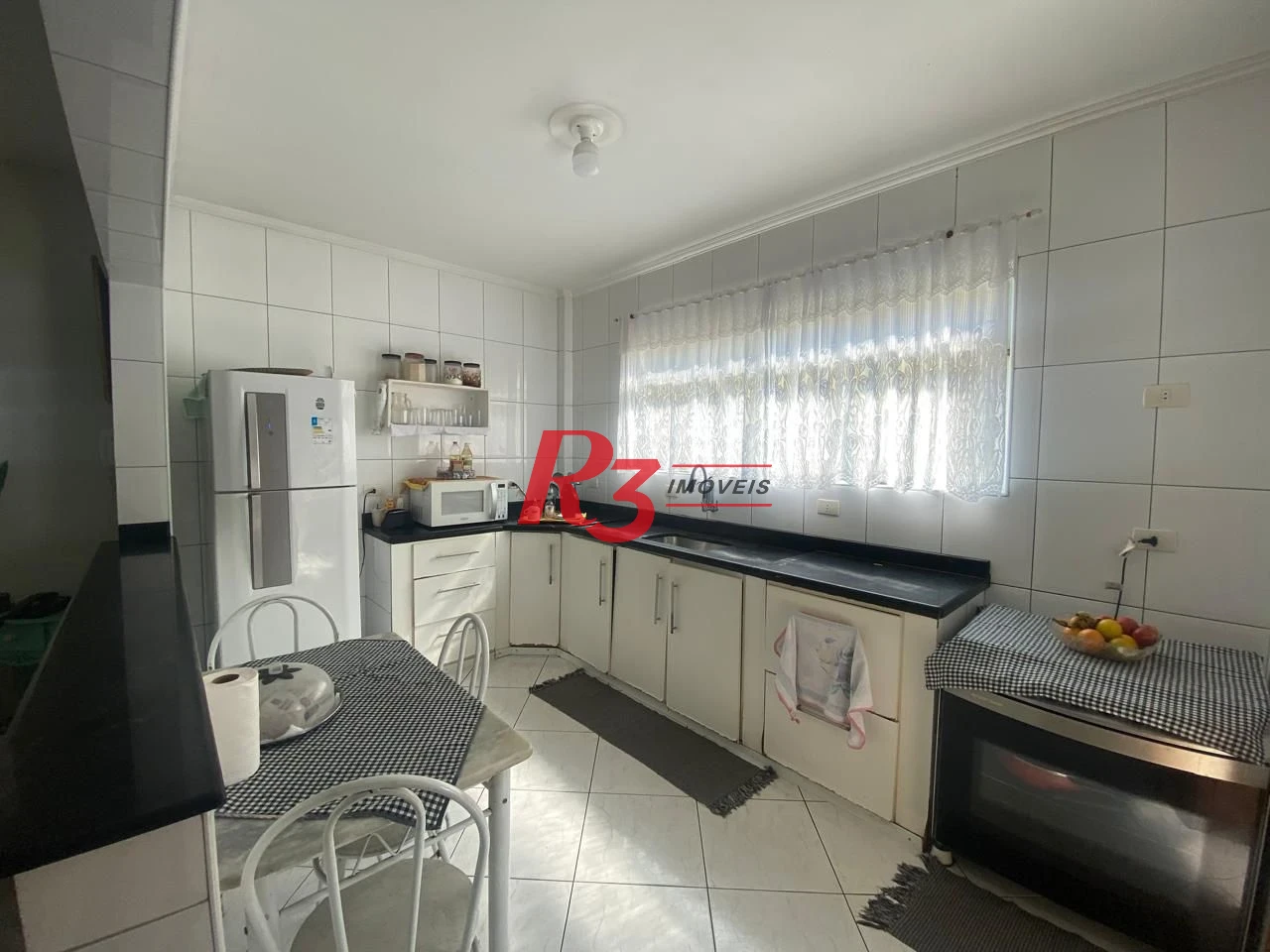 Casa à venda, 239 m² por R$ 1.300.000,00 - Ponta da Praia - Santos/SP