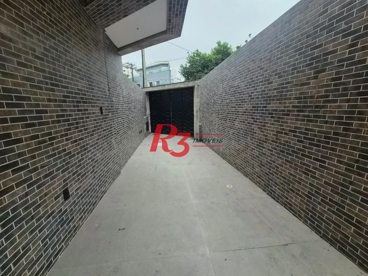 Casa com 3 dormitórios à venda, 100 m² por R$ 1.365.000,00 - Embaré - Santos/SP