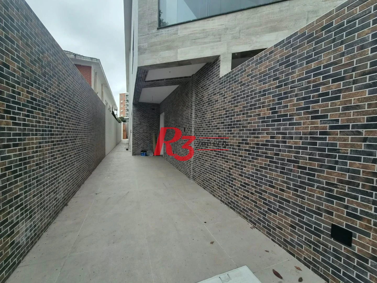Casa com 3 dormitórios à venda, 100 m² por R$ 1.365.000,00 - Embaré - Santos/SP