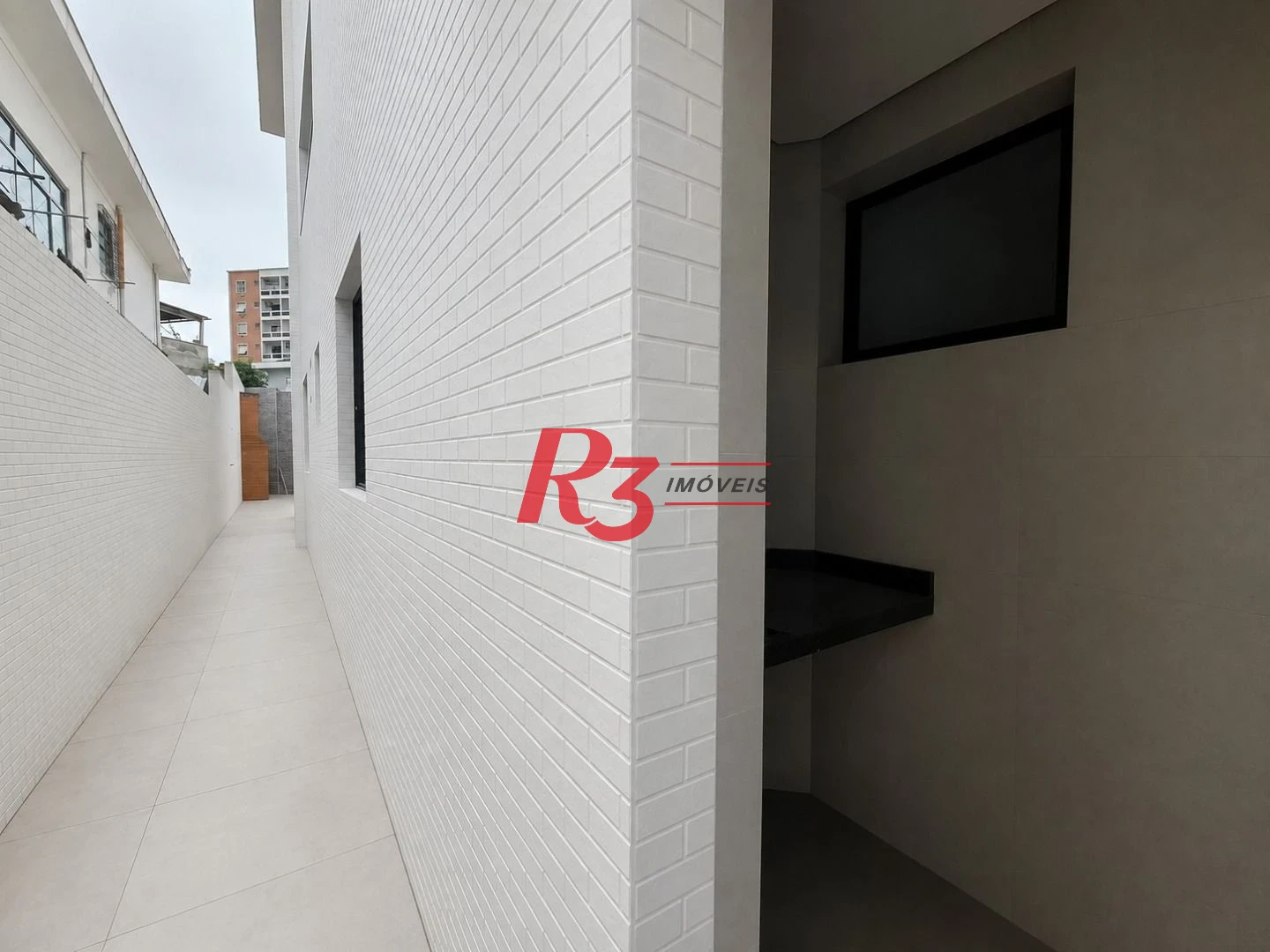 Casa com 3 dormitórios à venda, 100 m² por R$ 1.365.000,00 - Embaré - Santos/SP