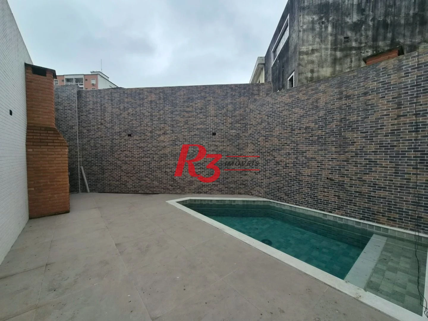 Casa com 3 dormitórios à venda, 100 m² por R$ 1.365.000,00 - Embaré - Santos/SP