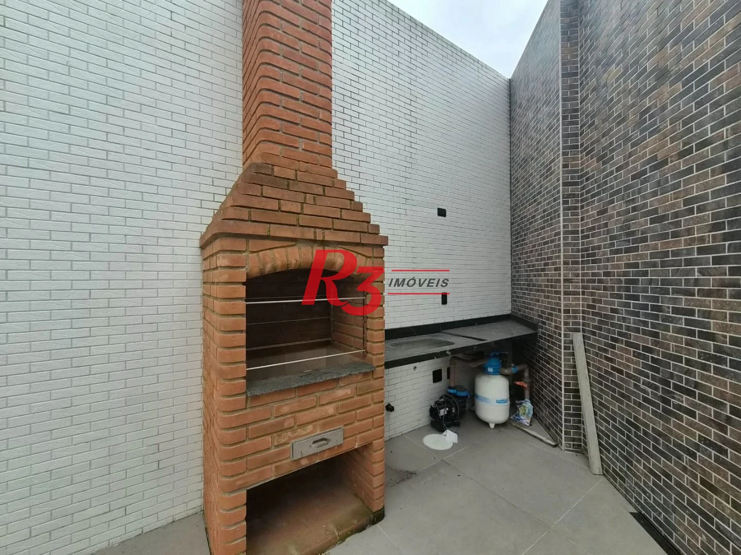Casa com 3 dormitórios à venda, 100 m² por R$ 1.365.000,00 - Embaré - Santos/SP
