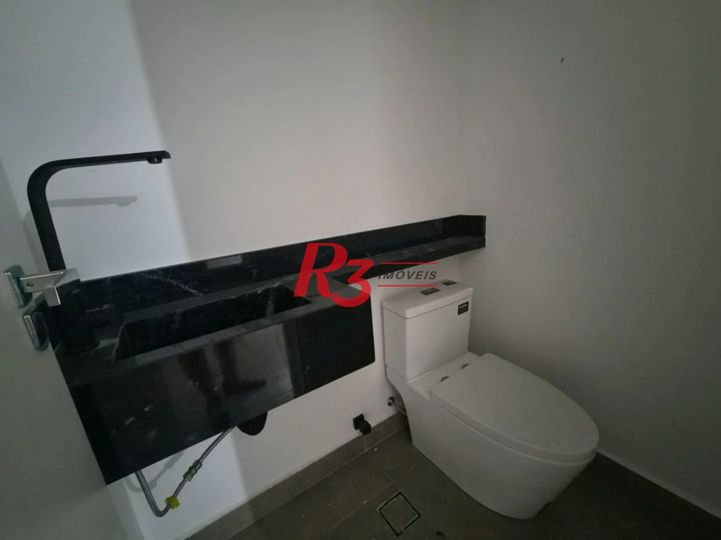 Casa com 3 dormitórios à venda, 100 m² por R$ 1.365.000,00 - Embaré - Santos/SP