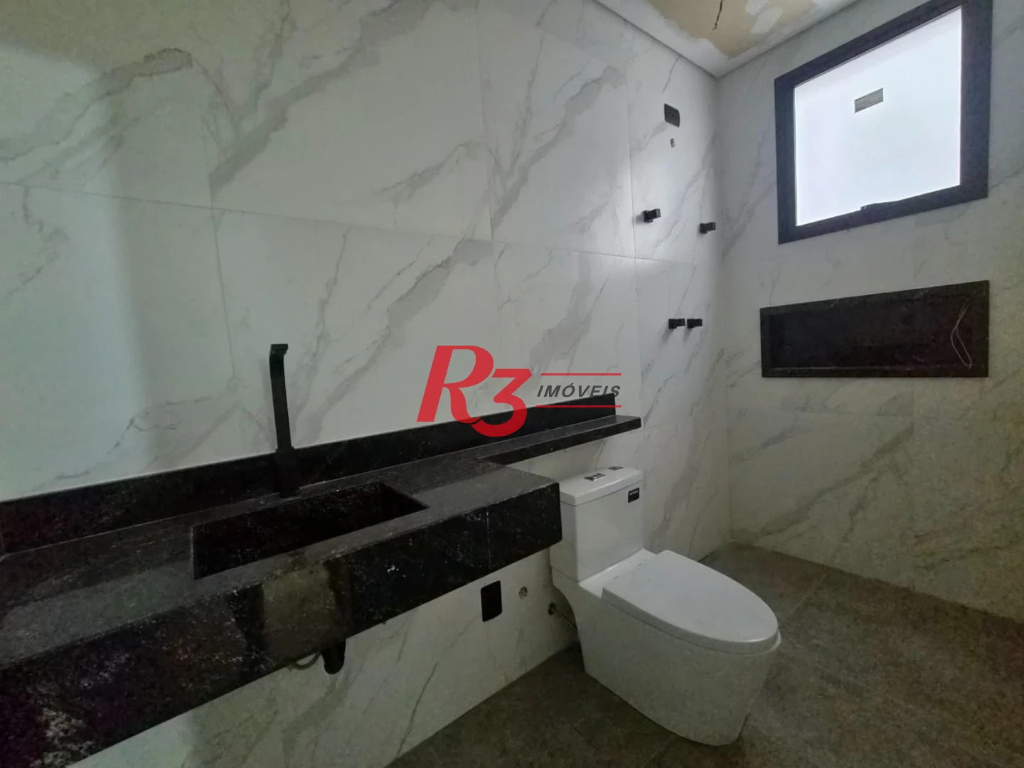 Casa com 3 dormitórios à venda, 100 m² por R$ 1.365.000,00 - Embaré - Santos/SP