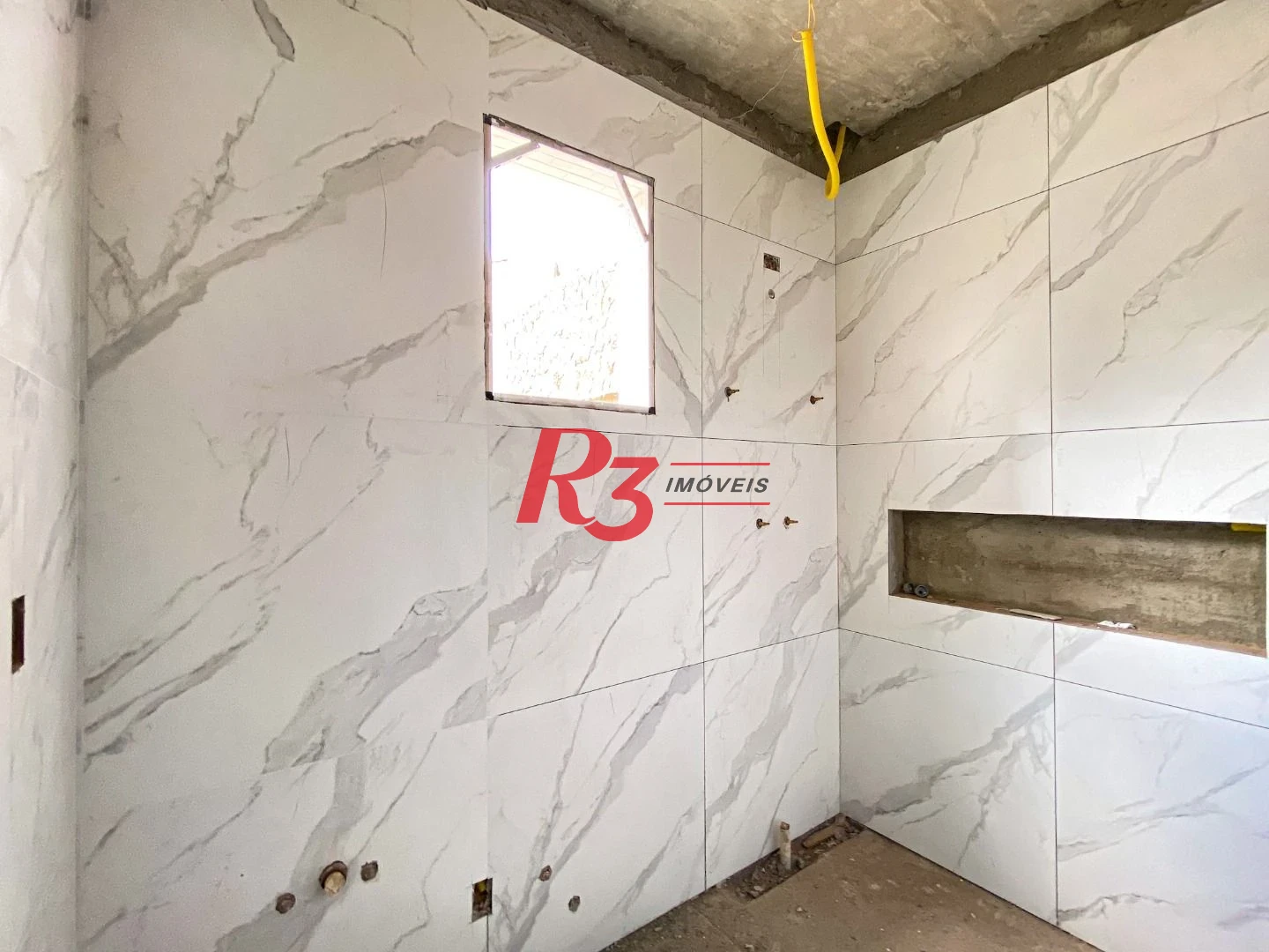 Casa com 3 dormitórios à venda, 130 m² por R$ 1.362.000,00 - Embaré - Santos/SP