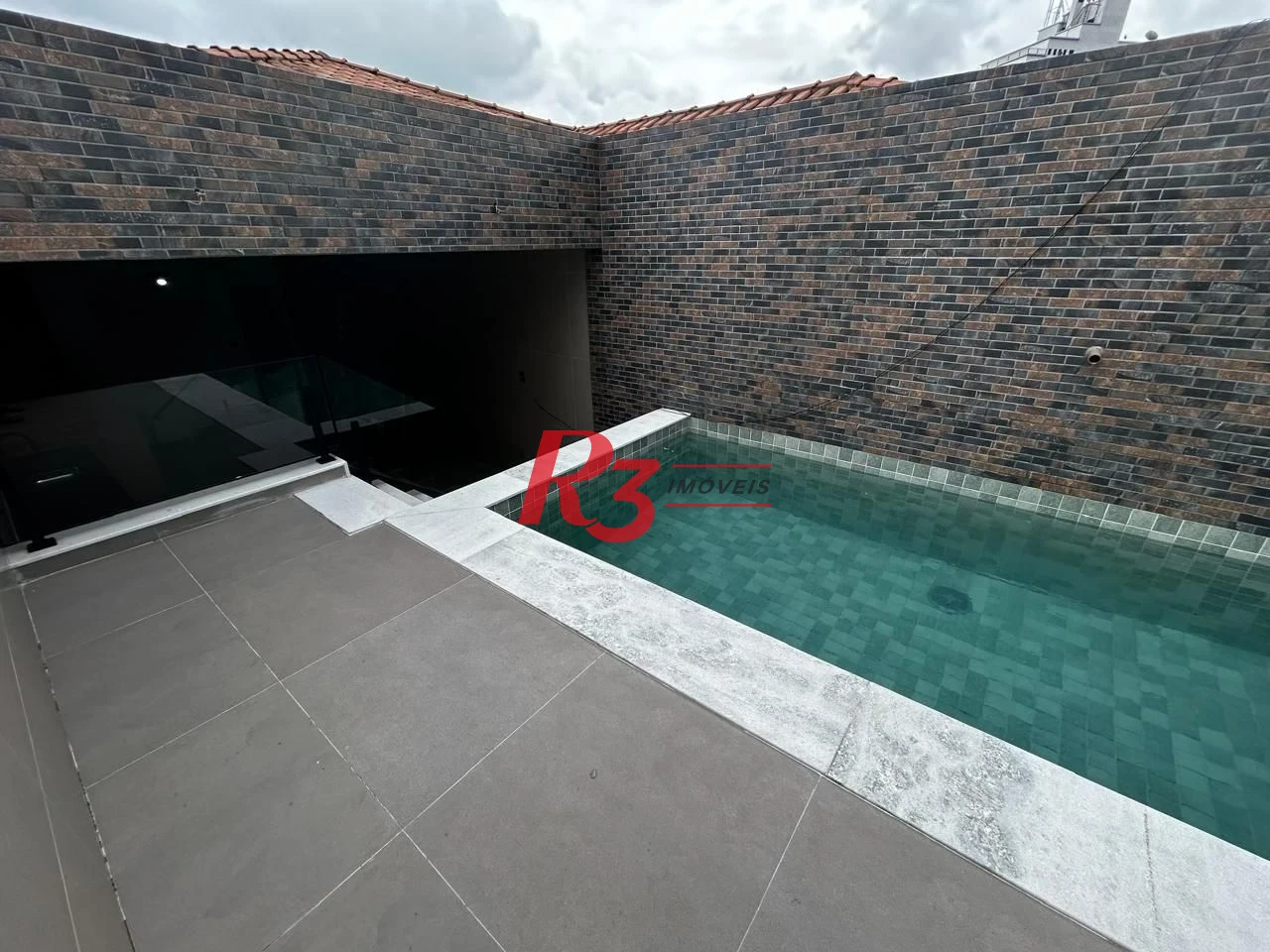 Casa com 3 dormitórios à venda, 150 m² por R$ 1.865.000,00 - Embaré - Santos/SP