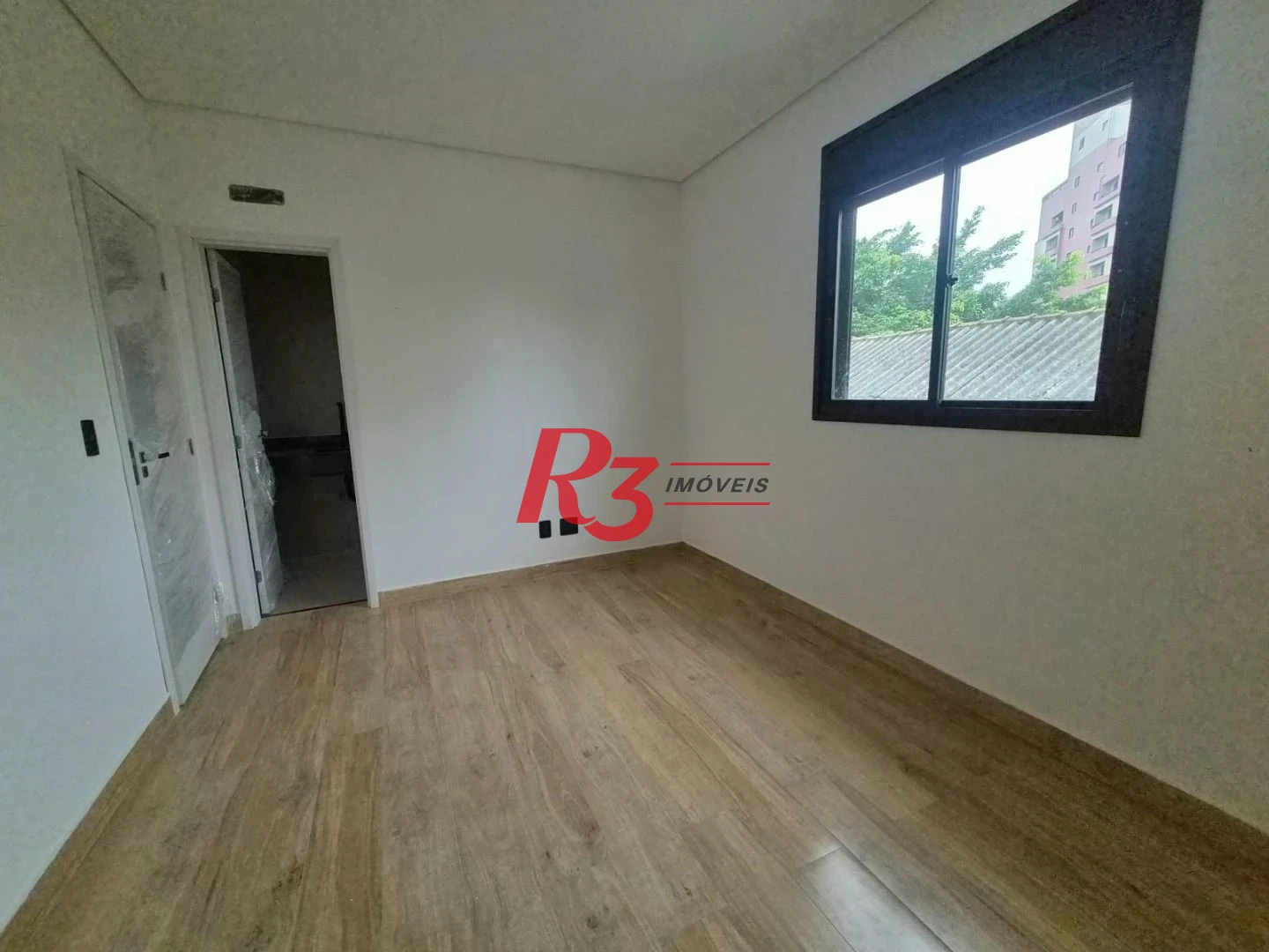 Casa com 3 dormitórios à venda, 150 m² por R$ 1.865.000,00 - Embaré - Santos/SP