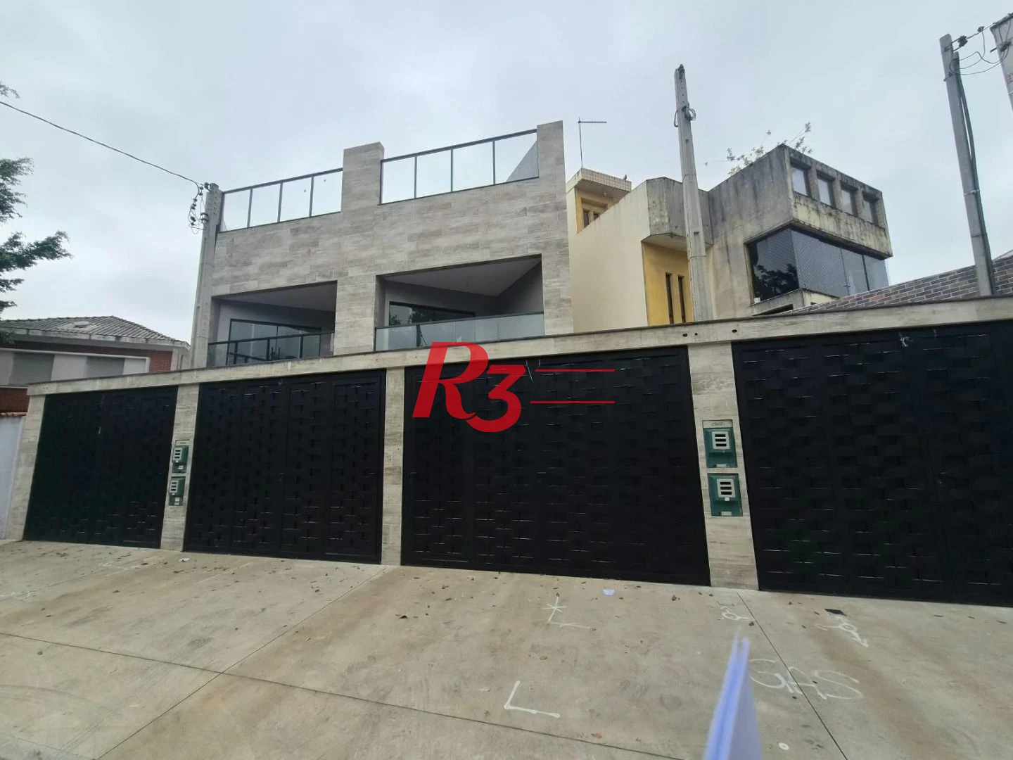 Casa com 3 dormitórios à venda, 290 m² por R$ 1.865.000,00 - Embaré - Santos/SP