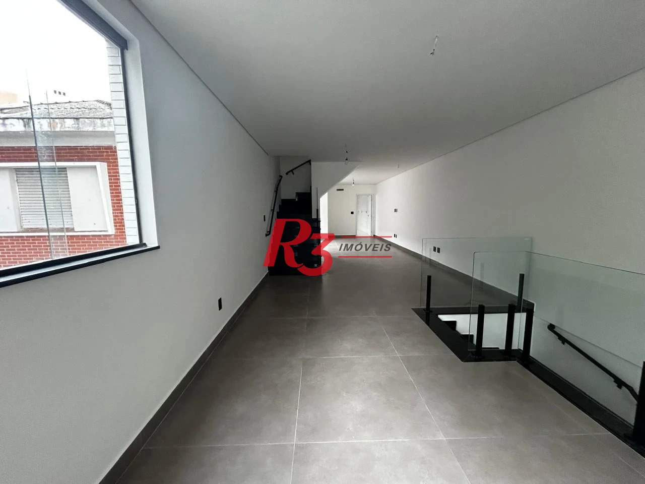 Casa com 3 dormitórios à venda, 290 m² por R$ 1.865.000,00 - Embaré - Santos/SP