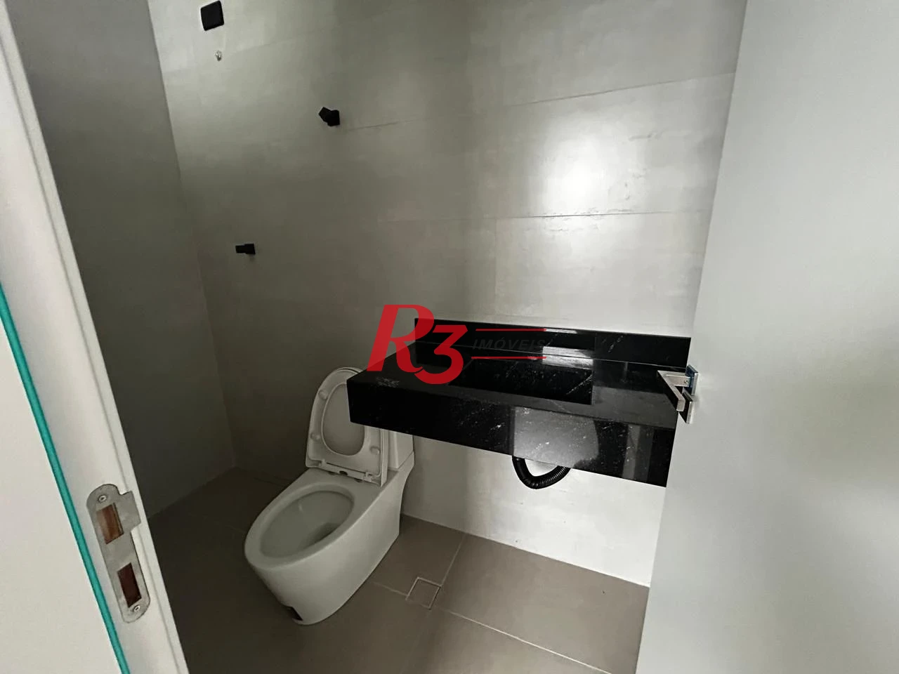 Casa com 3 dormitórios à venda, 290 m² por R$ 1.865.000,00 - Embaré - Santos/SP