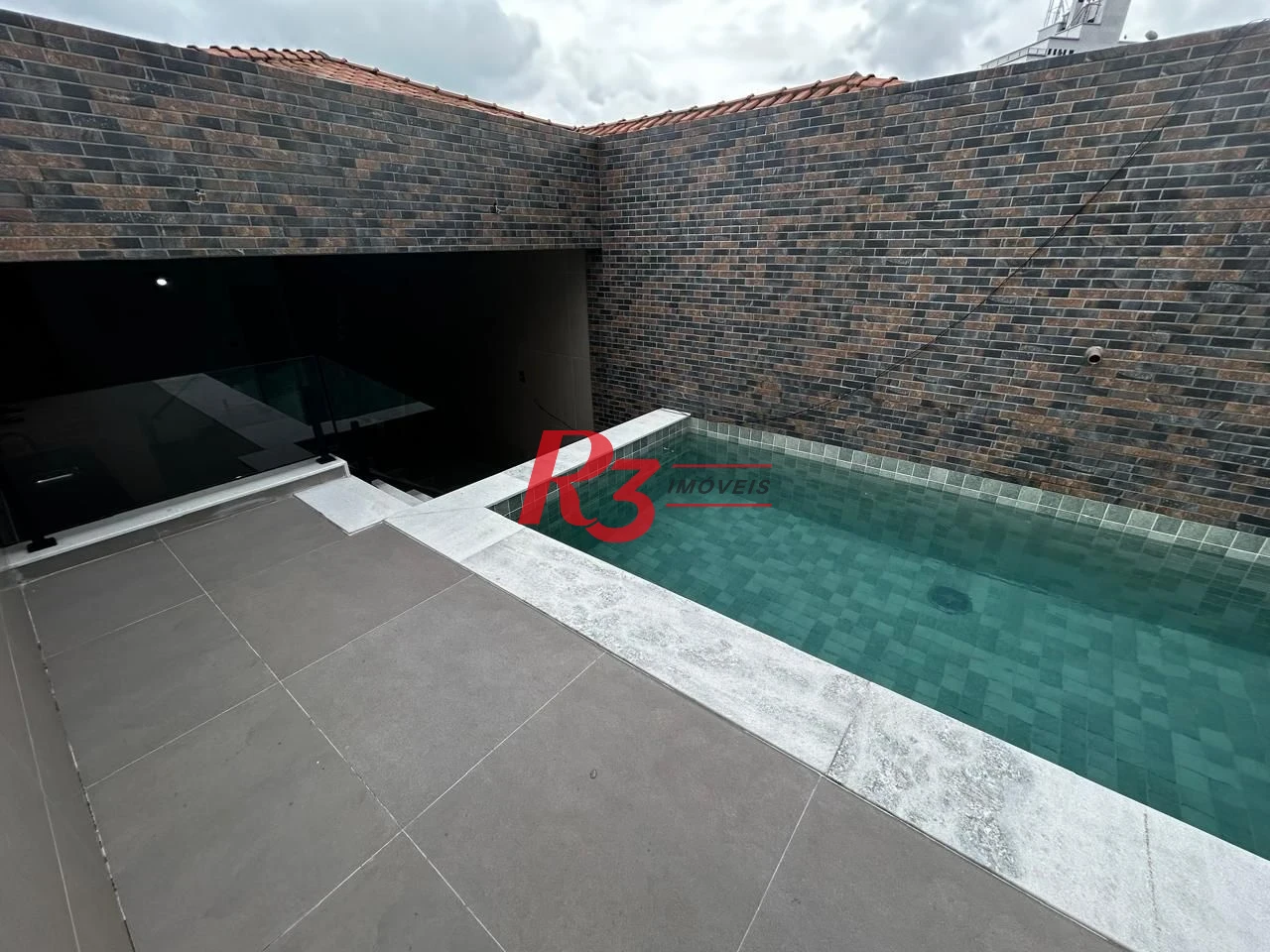 Casa com 3 dormitórios à venda, 290 m² por R$ 1.865.000,00 - Embaré - Santos/SP