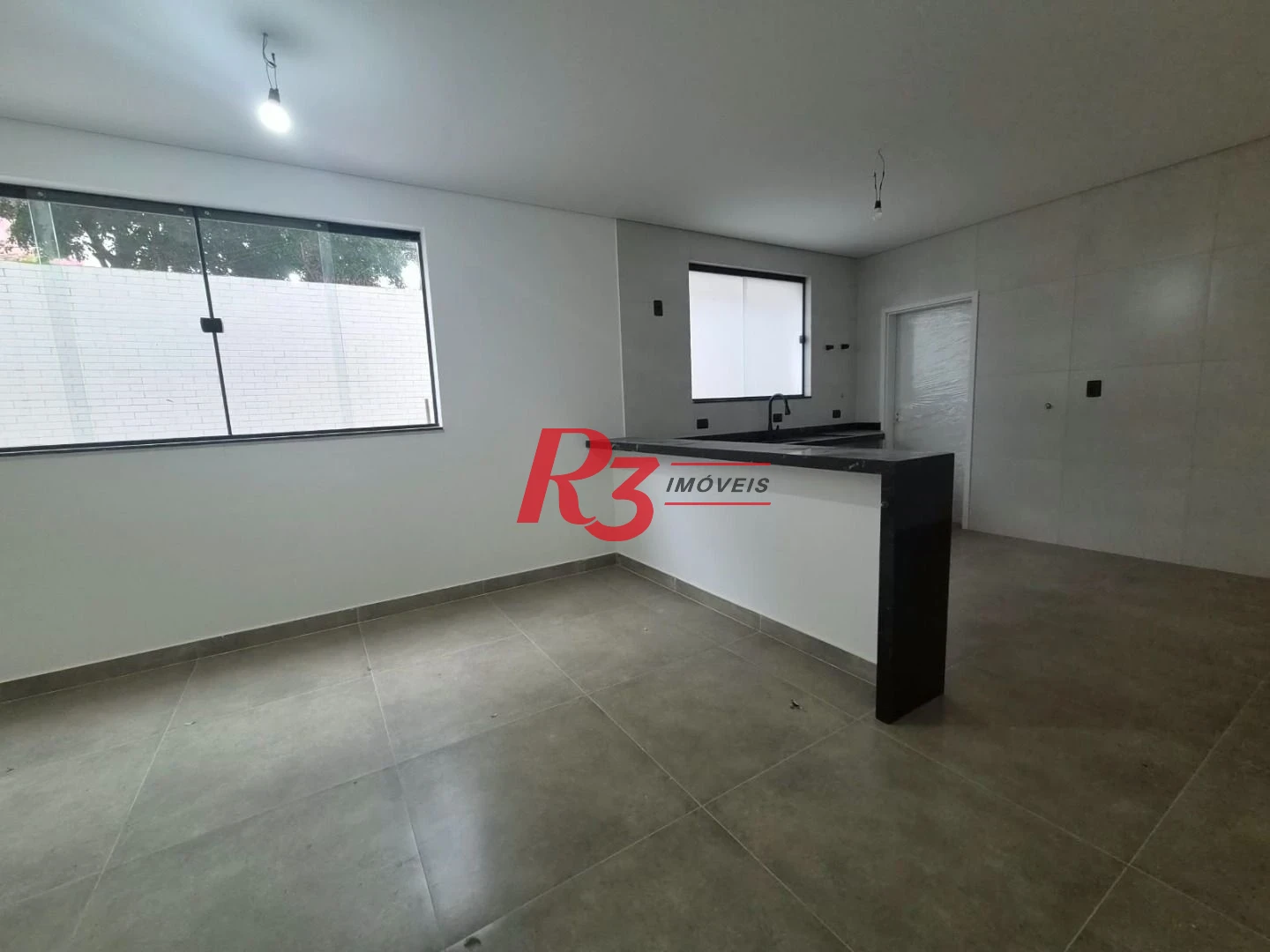 Casa com 3 dormitórios à venda, 130 m² por R$ 1.365.000,00 - Embaré - Santos/SP