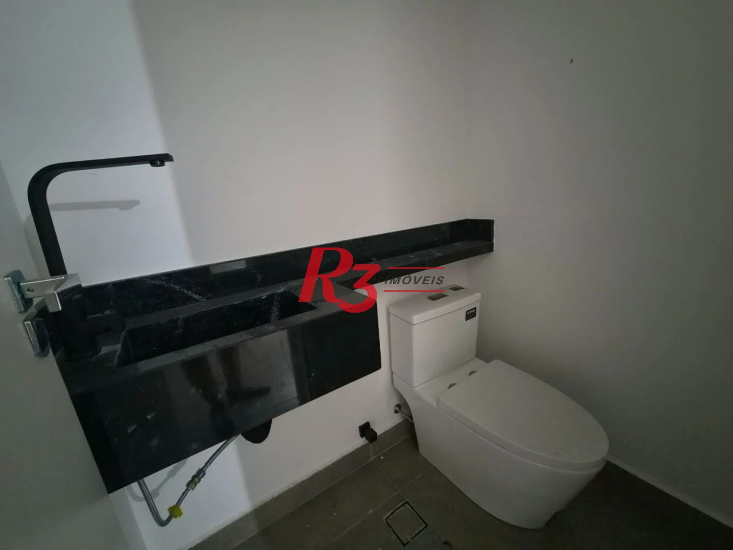 Casa com 3 dormitórios à venda, 130 m² por R$ 1.365.000,00 - Embaré - Santos/SP