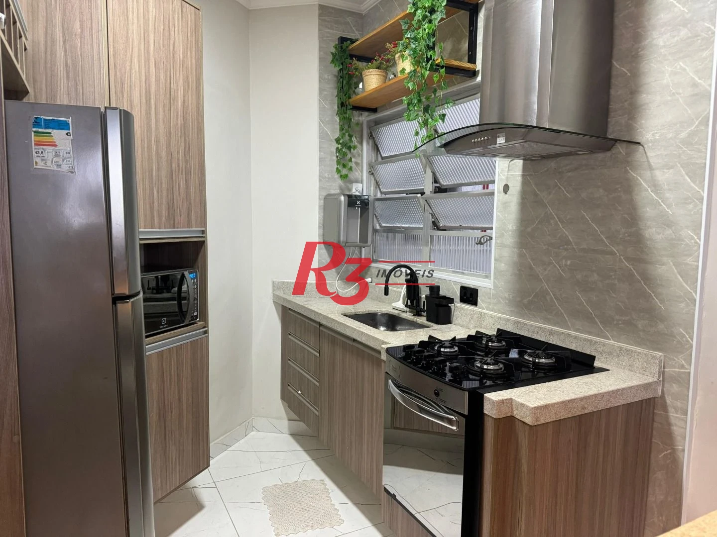 Apartamento com 2 dormitórios à venda, 85 m² por R$ 650.000,00 - Gonzaga - Santos/SP