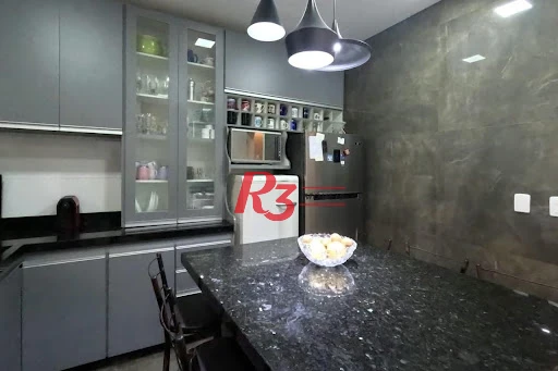 Sobrado com 3 dormitórios à venda, 140 m² por R$ 860.000,00 - Campo Grande - Santos/SP