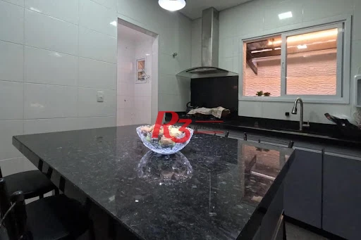 Sobrado com 3 dormitórios à venda, 140 m² por R$ 860.000,00 - Campo Grande - Santos/SP