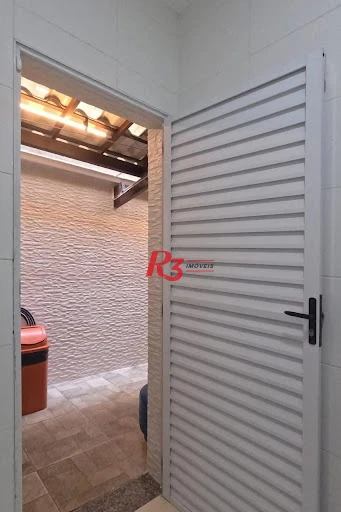Sobrado com 3 dormitórios à venda, 140 m² por R$ 860.000,00 - Campo Grande - Santos/SP