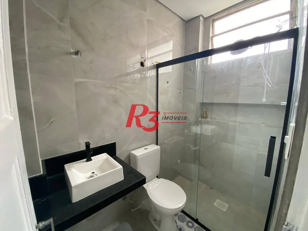 Apartamento com 2 dormitórios à venda, 55 m² por R$ 410.000,00 - Embaré - Santos/SP