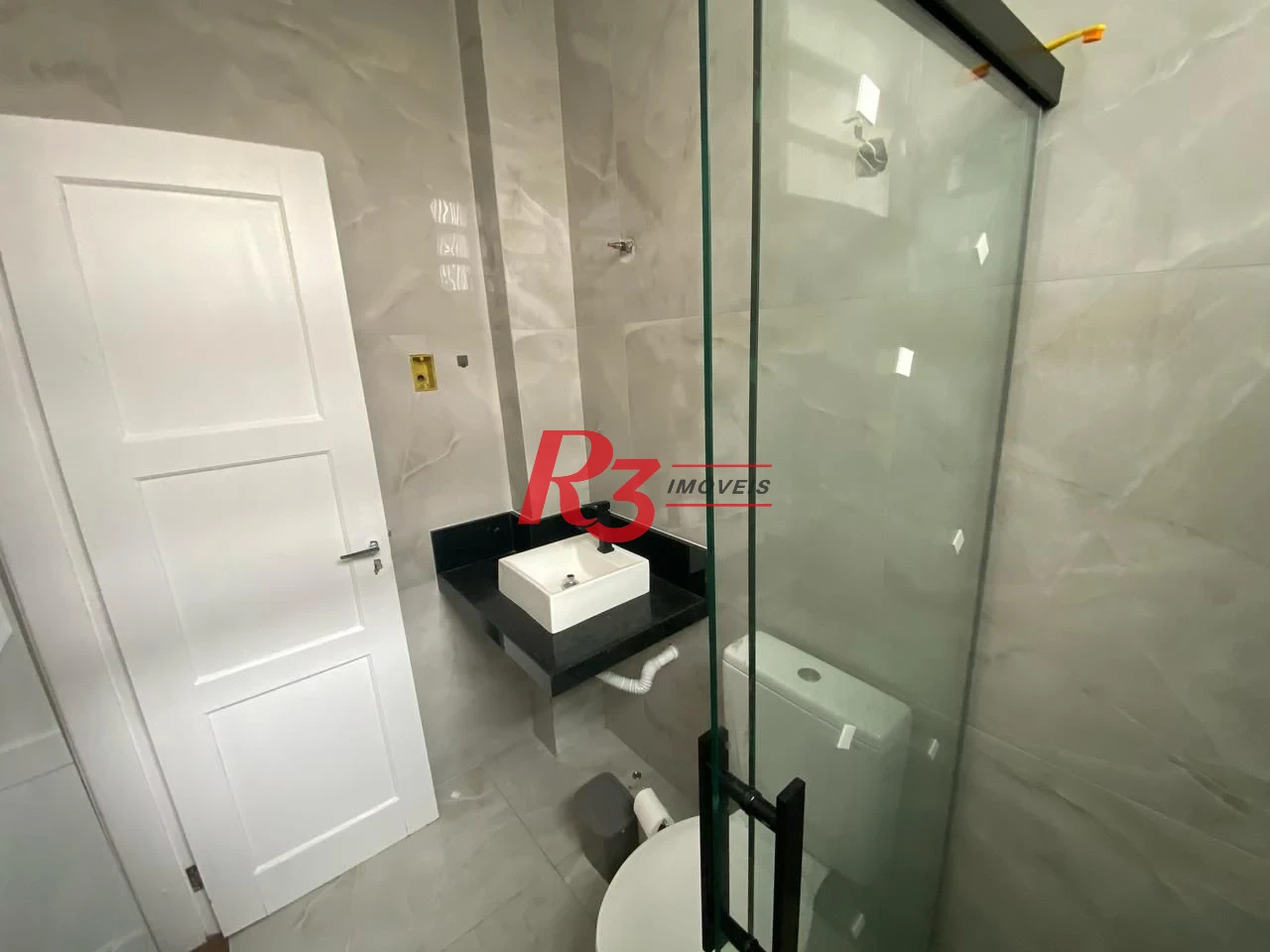 Apartamento com 2 dormitórios à venda, 55 m² por R$ 410.000,00 - Embaré - Santos/SP