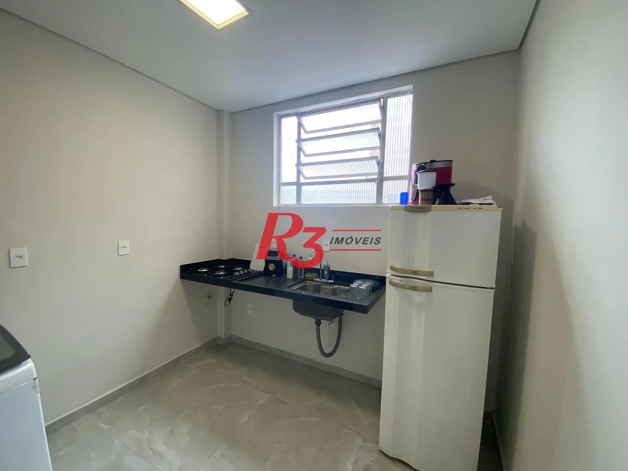 Apartamento com 2 dormitórios à venda, 55 m² por R$ 410.000,00 - Embaré - Santos/SP