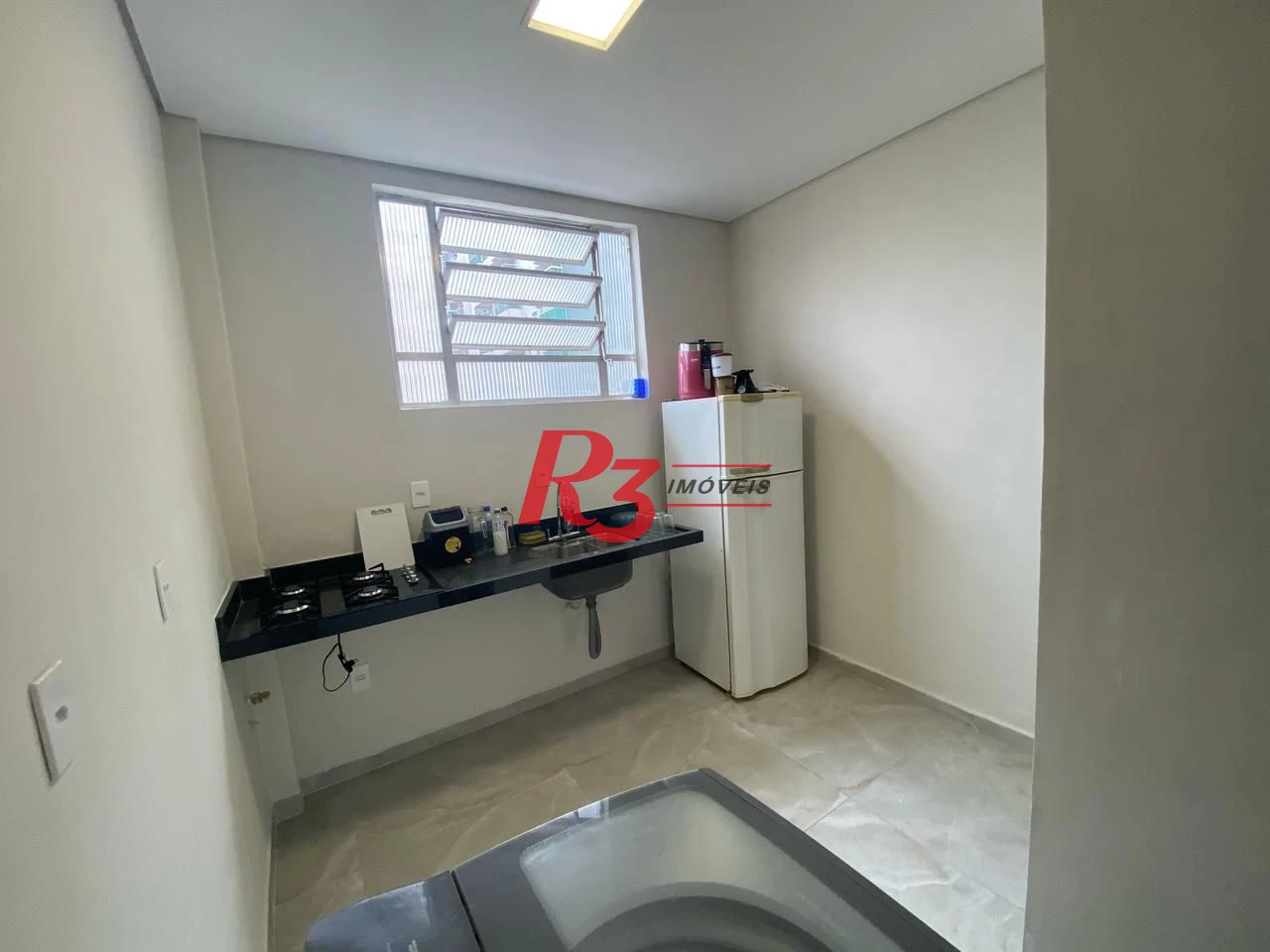 Apartamento com 2 dormitórios à venda, 55 m² por R$ 410.000,00 - Embaré - Santos/SP