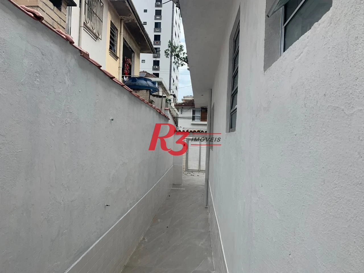 Casa com 2 dormitórios para alugar, 100 m² por R$ 4.100,00/mês - Embaré - Santos/SP
