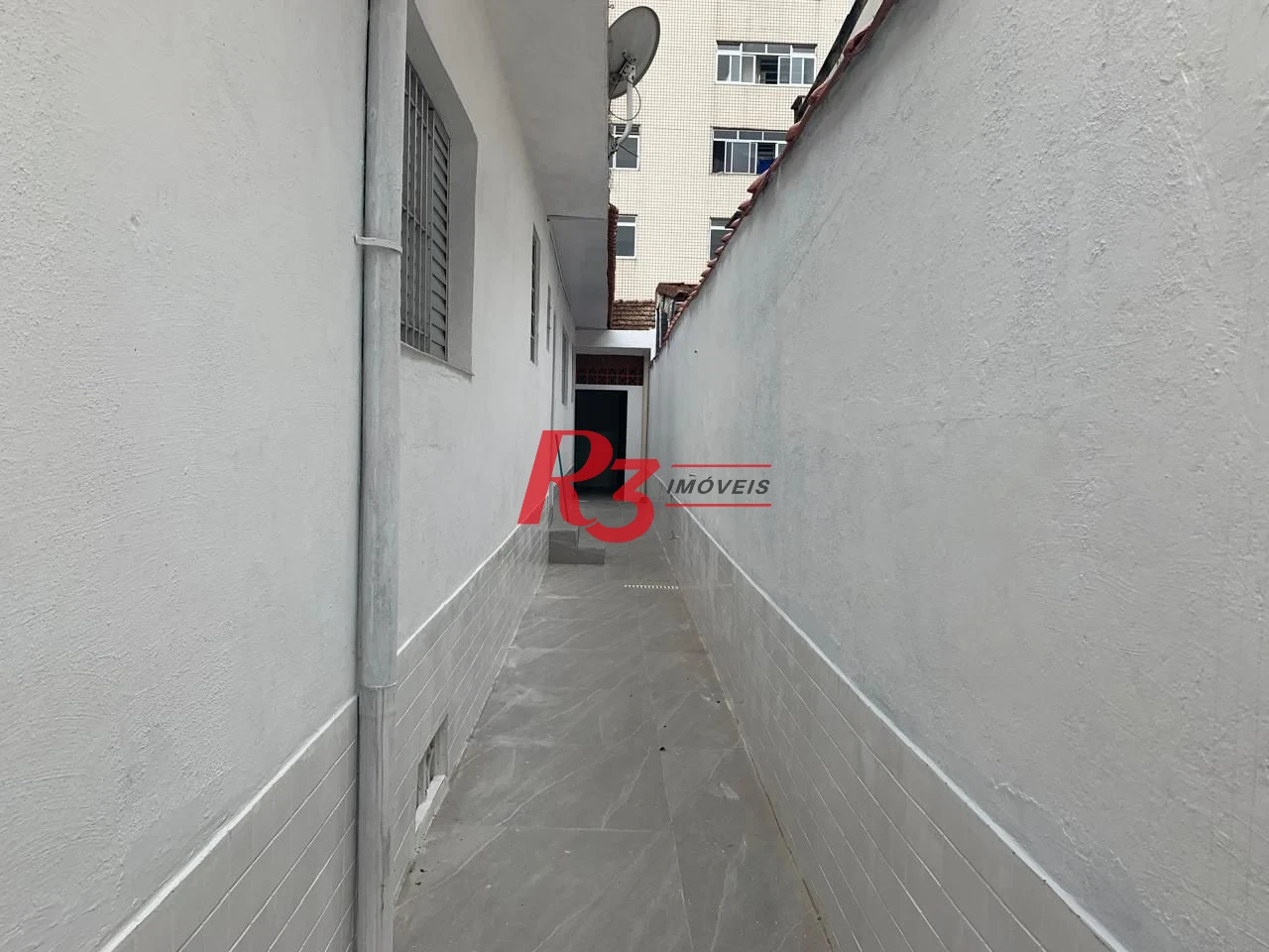 Casa com 2 dormitórios para alugar, 100 m² por R$ 4.100,00/mês - Embaré - Santos/SP