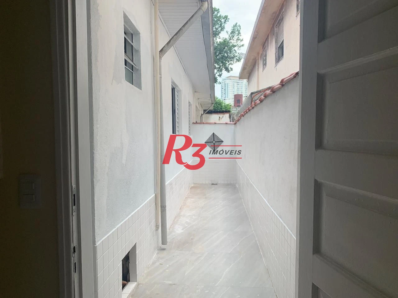 Casa com 2 dormitórios para alugar, 100 m² por R$ 4.100,00/mês - Embaré - Santos/SP